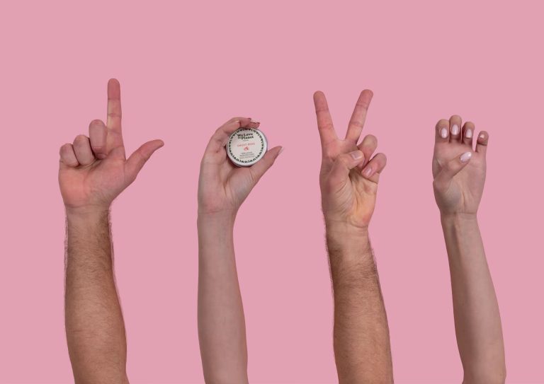 Hands spell LOVE with a deodorant balm